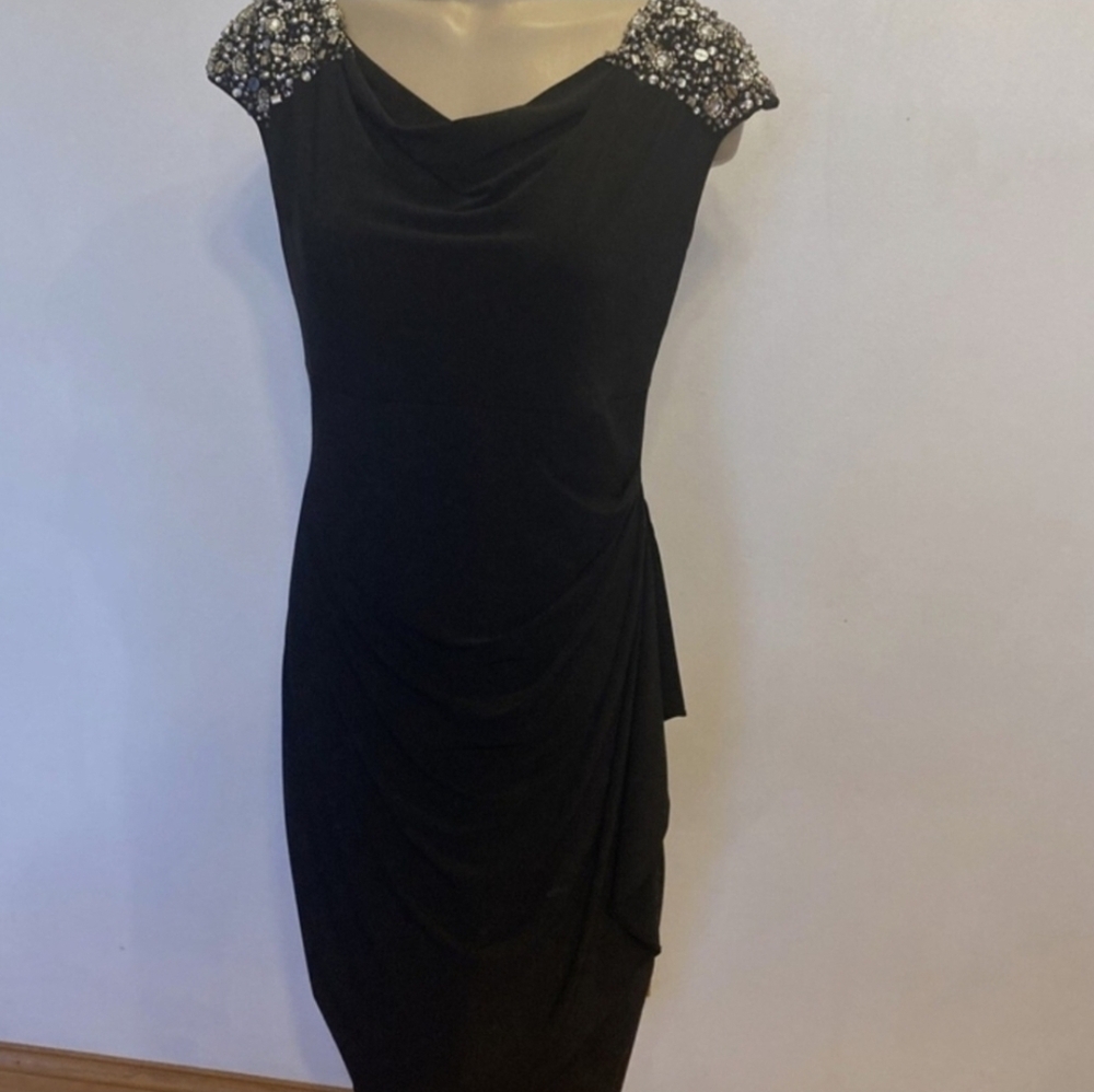 Elegant Black Dress with Embellished Shoulders
